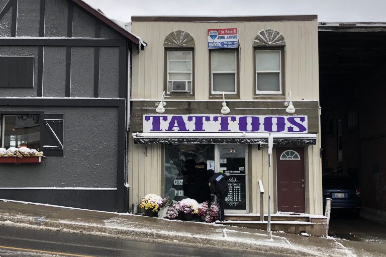 Tattoo shop window smashed in downtown Huntsville